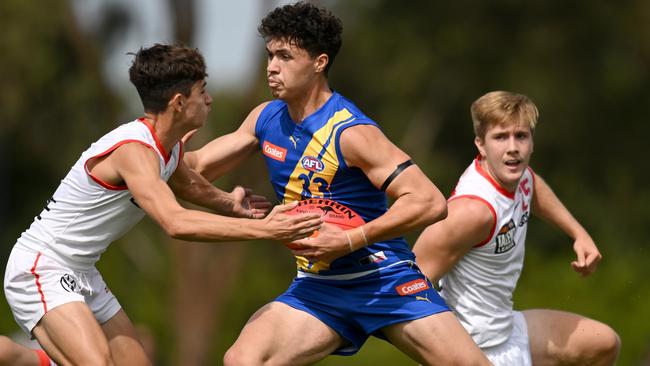 MELBOURNE, AUSTRALIA - MARCH 25: Keighton Matofai-Forbes of the Jets takes possession of the ball during the round one Coates Talent League match between Western Jets and Sydney Swans Academy at Highgate Reserve on March 25, 2023 in Melbourne, Australia. (Photo by Morgan Hancock/AFL Photos/via Getty Images)