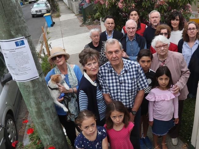 Roy Lilley and Betty Davis (front and centre) were worried one station would be installed on an electrical pole near their Hawthorn cottage. Picture: David Crosling