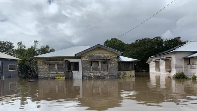 Flood water fills Ewing Street on March 1, 2022, a day after Lismore was hit by a record flood. Picture: Stuart Cumming