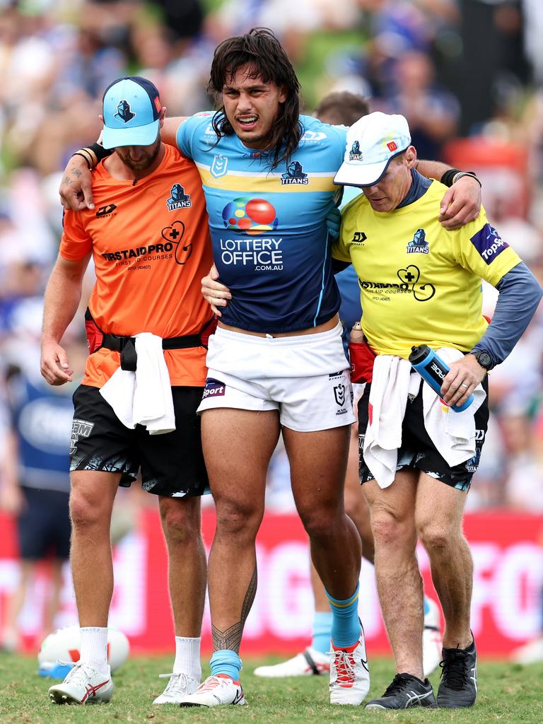 SYDNEY, AUSTRALIA - MARCH 23: Tino Fa'asuamaleaui of the Titans is helped from the field during the round three NRL match between Canterbury Bulldogs and Gold Coast Titans at Belmore Sports Ground, on March 23, 2024, in Sydney, Australia. (Photo by Brendon Thorne/Getty Images)