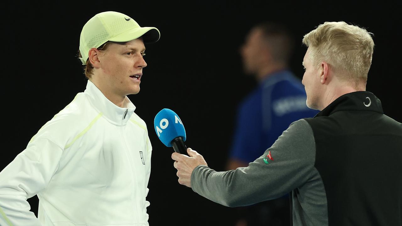 Jannik Sinner and Jim Courier shared one of the better moments of the tournament. (Photo by Clive Brunskill/Getty Images)