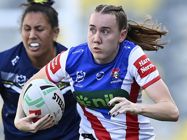 TOWNSVILLE, AUSTRALIA - SEPTEMBER 21: Tamika Upton of the Knights makes a break during the round nine NRLW match between North Queensland Cowboys and Newcastle Knights at Queensland Country Bank Stadium on September 21, 2024 in Townsville, Australia. (Photo by Ian Hitchcock/Getty Images)