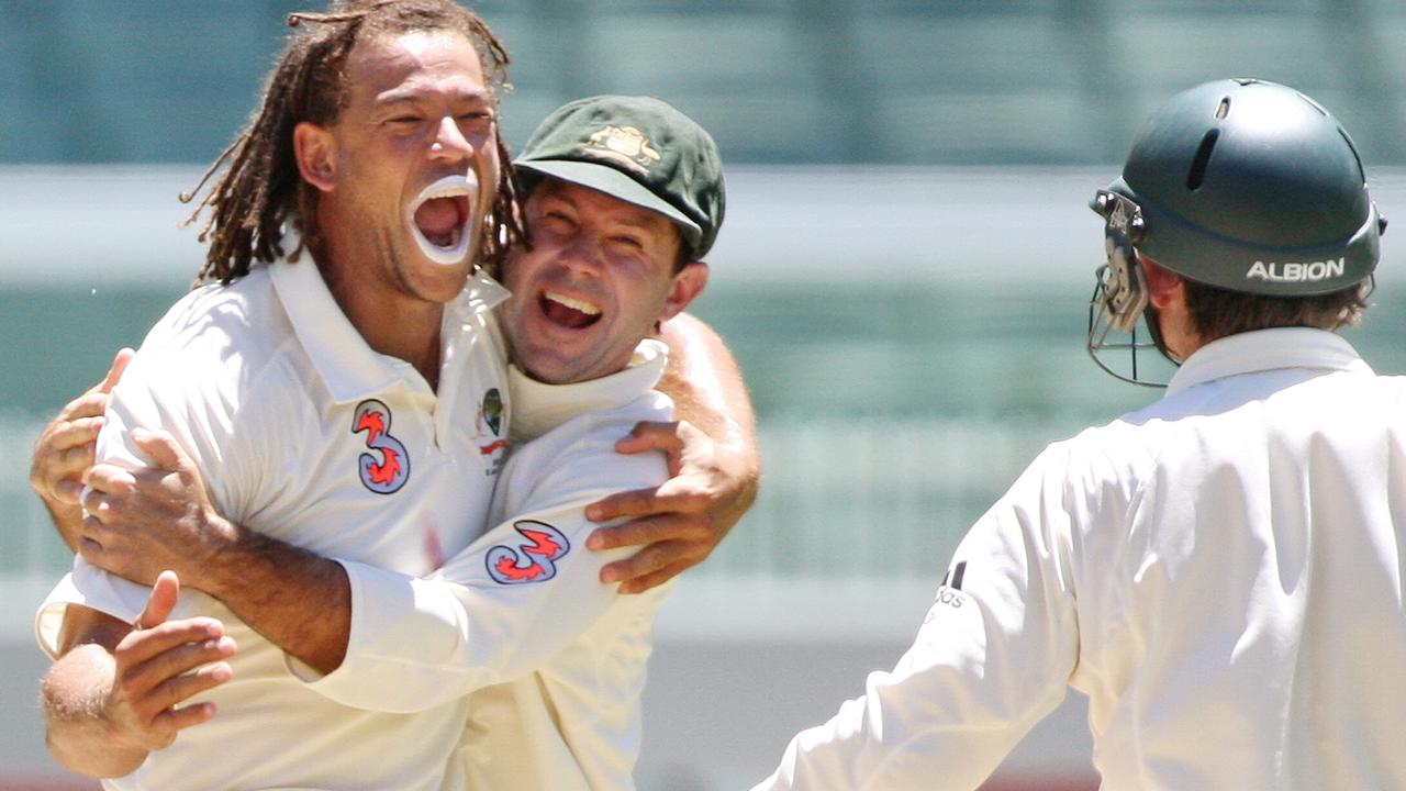 Ricky Ponting, Andrew Symonds and Adam Gilchrist celebrate a wicket.