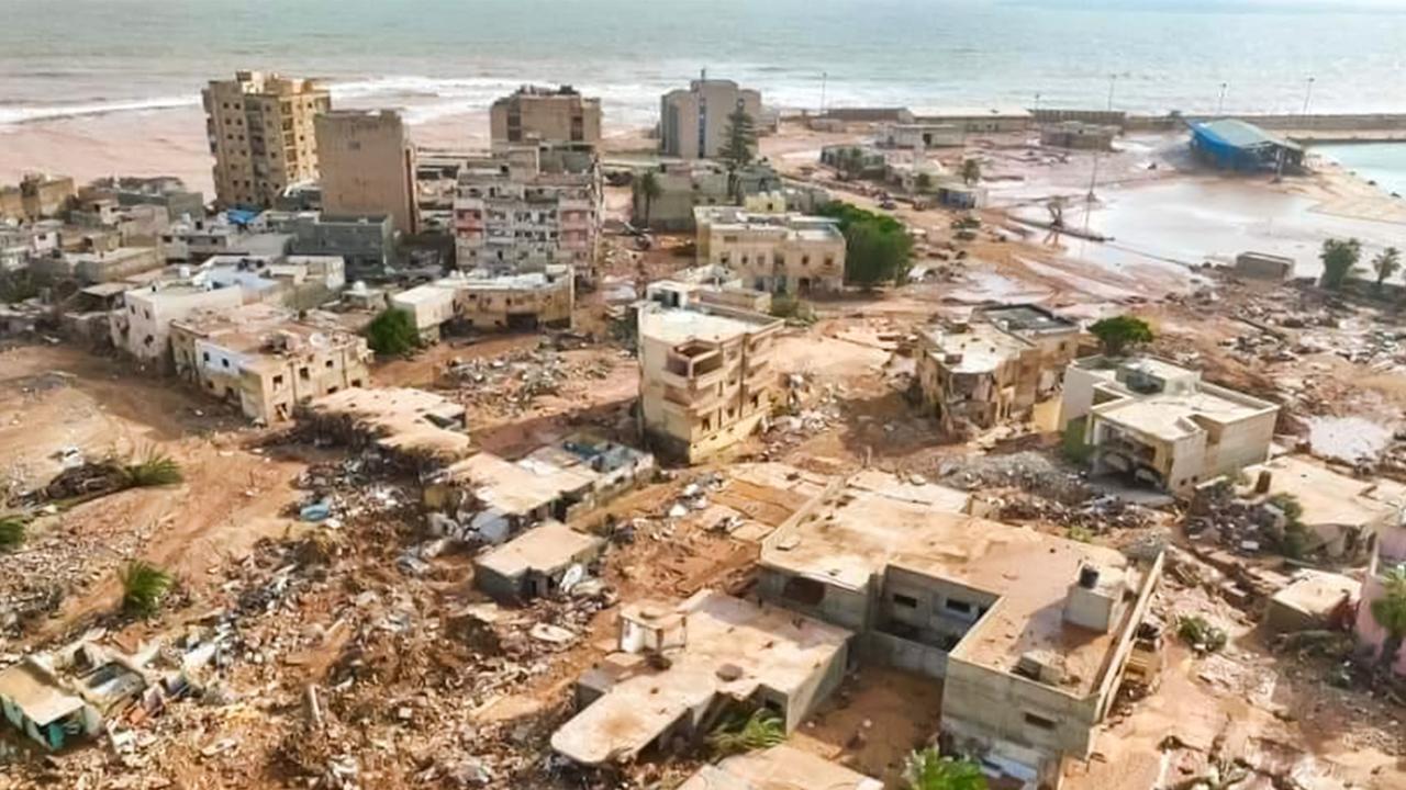 This handout picture released on the account of the Libyan Red Crescent on the X (formerly Twitter) platform on September 13, 2023, shows a general view of destruction in the wake of floods after the Mediterranean storm "Daniel" hit Libya's eastern city of Derna. A global effort to assist stricken Libya gathered pace on September 14 after a tsunami-like flood killed nearly 4,000 people and left thousands missing. Military transport aircraft from Middle Eastern and European nations, along with ships, have been ferrying emergency aid to the North African country already scarred by war. (Photo by Libyan Red Crescent / AFP) / RESTRICTED TO EDITORIAL USE - MANDATORY CREDIT "AFP PHOTO / HO / LIBYAN RED CRESCENT" - NO MARKETING NO ADVERTISING CAMPAIGNS - DISTRIBUTED AS A SERVICE TO CLIENTS