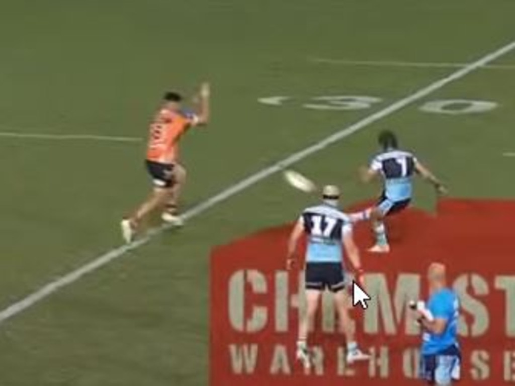 Terrell May charged down a Nicho Hynes field goal in the 79th minute of the Tigers vs Sharks match in Round 8. The Tigers went on to win the game in golden point.