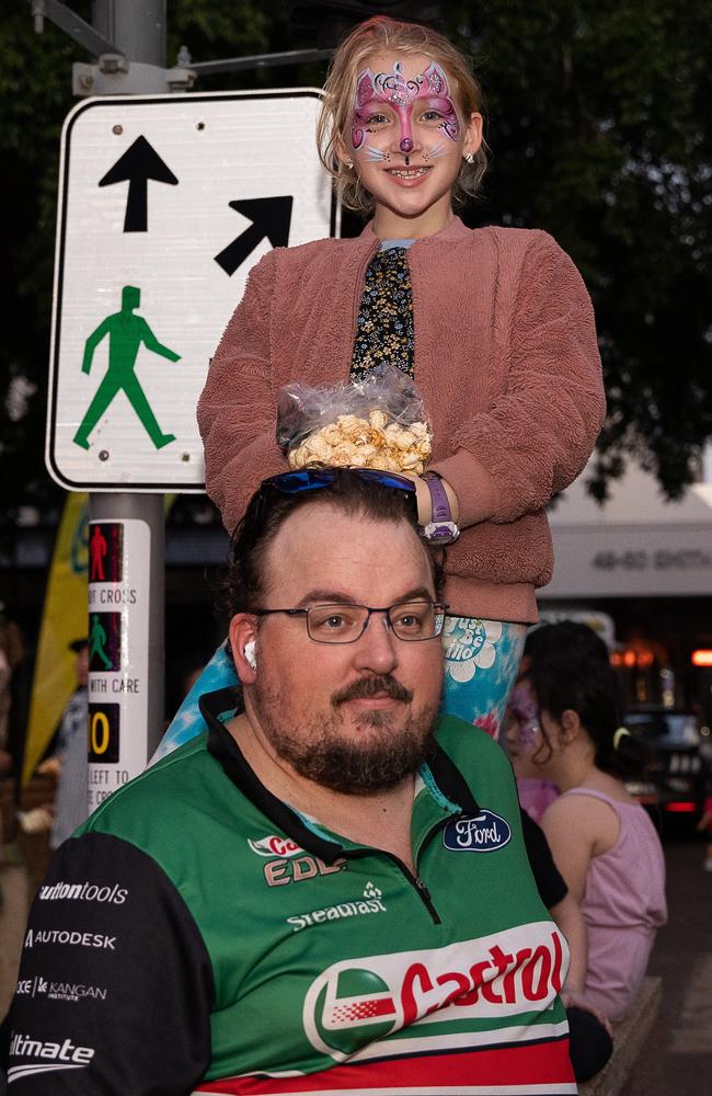 Phil Bedard and Charlotte Bedard were among thousands of racing fans welcomed the Night Transporter Convoy into the Darwin CBD ahead of the 2023 Darwin Supercars. Picture: Pema Tamang Pakhrin