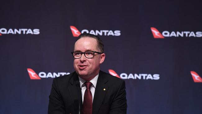 Alan Joyce announces Qantas’s record half-year profit in Sydney yesterday.