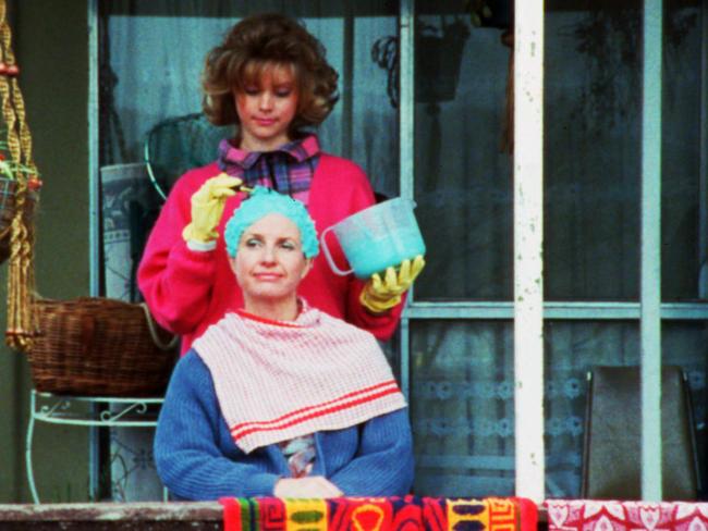 Sophie Lee, as Tracey Petropoulous, with her mum Sal, played by Anne Tenney, in a scene from The Castle.