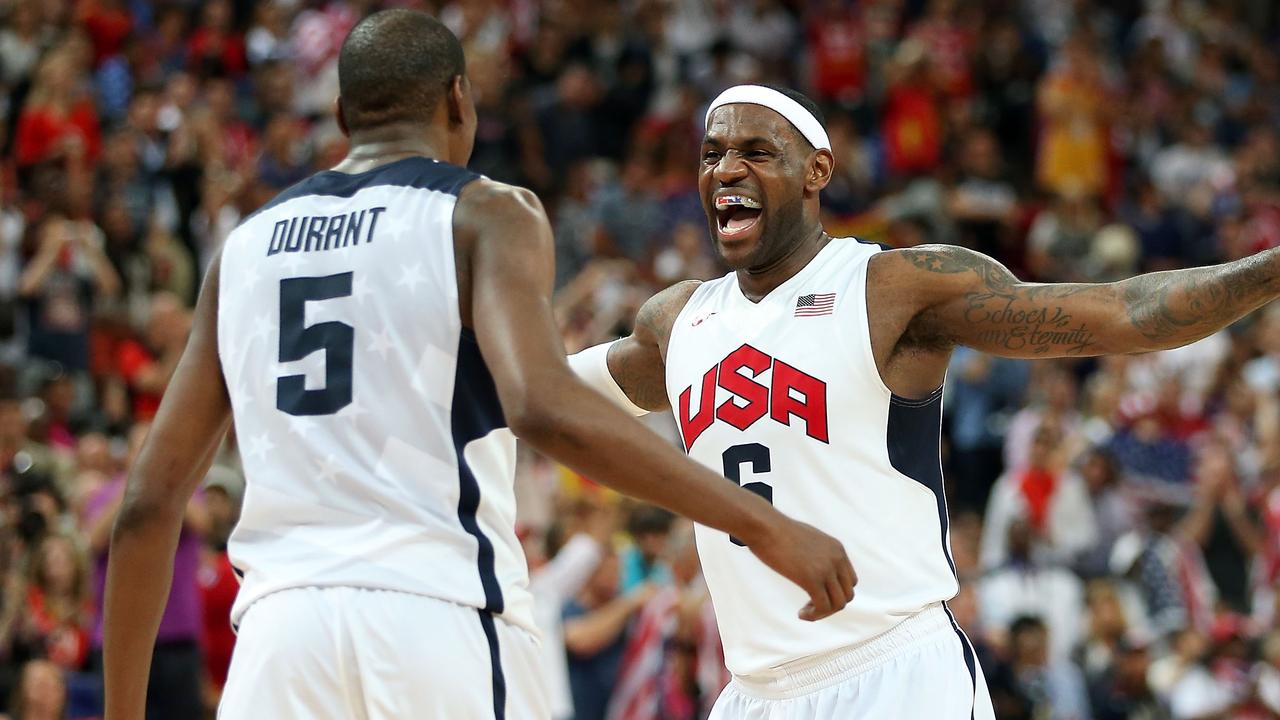 LONDON, ENGLAND - AUGUST 12: Kevin Durant #5 and LeBron James #6 of the United States celebrate in the Men's Basketball gold medal game between the United States and Spain on Day 16 of the London 2012 Olympics Games at North Greenwich Arena on August 12, 2012 in London, England. (Photo by Christian Petersen/Getty Images)