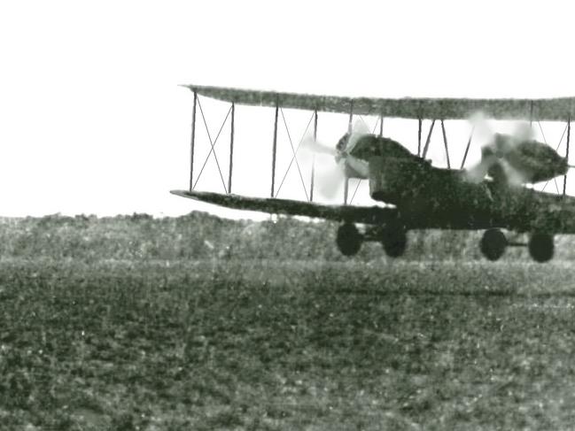 On February 12, 1920, the Smith brothers had thanked Harry Corones who had been their host - along with others in the district - during their unexpected stay of more than 50 days. Repairs to an engine and propeller of the Vickers Vimy plane, damaged in flight, had disrupted their journey from Darwin to Melbourne after their prize-winning flight in the England to Australia race. The brothers planned an early take-off from the Ward Plain as they headed for Sydney. Above: the Vickers Vimy with - by this time - Sirs Ross and Keith Smith, mechanics Wally Shiers and Jim Bennett and photographer Frank Hurley as it lifted off from the Ward Plain.