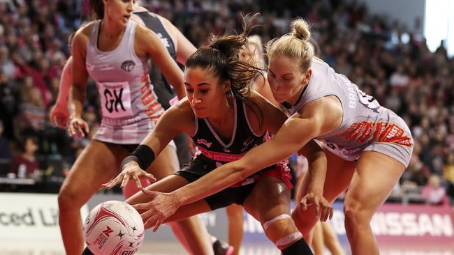 Maria Folau fights for the ball against Collingwood’s April Brandley. Picture SARAH REED