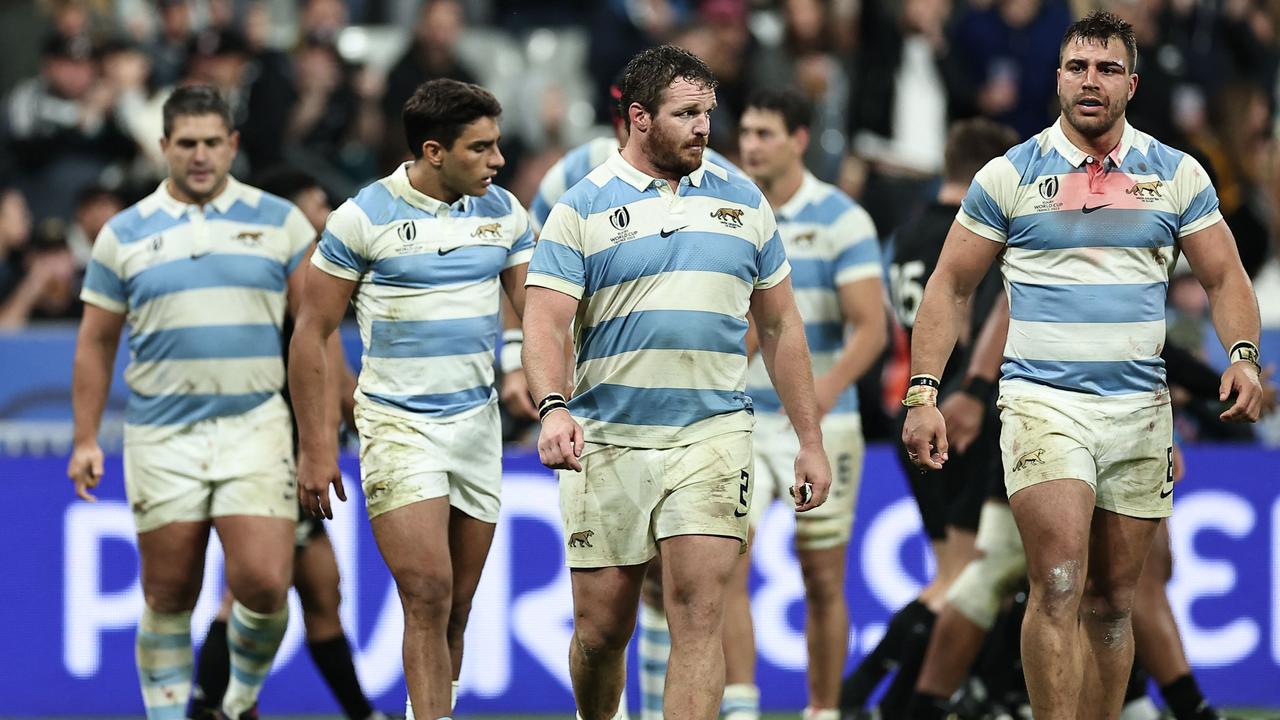 Argentina captain Julian Montoya (C) and teammates react to the All Blacks demolition. Picture: AFP