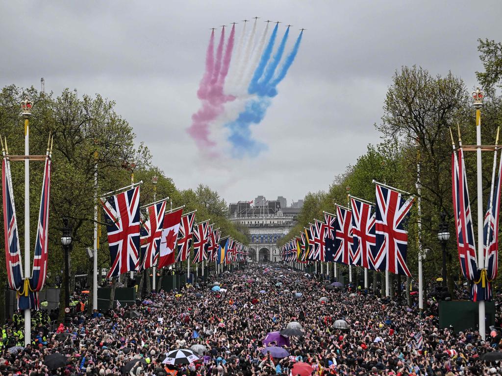 The "Red Arrows" flow over The Mall. Picture: AFP