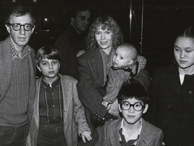 Woody Allen and Mia Farrow pictured in 1986 with Fletcher, Dylan (centre, with Farrow), Soon-Yi Previn (far right) and Moses (front). Picture: Supplied