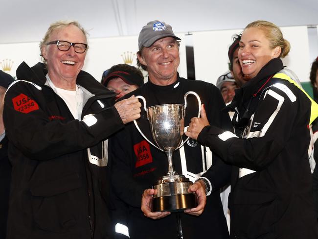 US billionaire Jim Clark and his wife, Kristy Hinze with boat skipper Ken Read after Clark’s yacht the Comanche won the Sydney to Hobart Yacht Race in 2015. Picture: Kim Eiszele