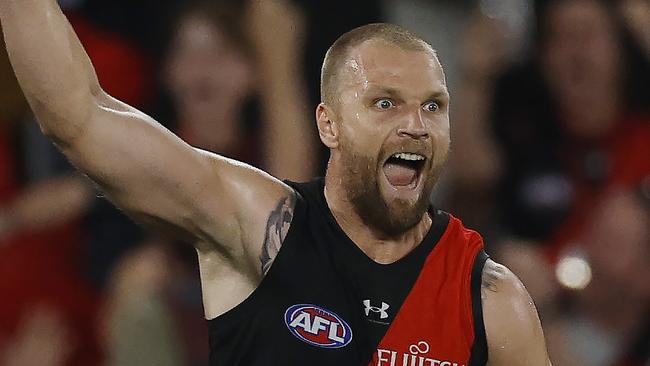 MELBOURNE , AUSTRALIA. March 30, 2024.  AFL Round 3. Essendon vs St Kilda at Marvel Stadium.   Jake Stringer of the Bombers celebrates his goal that put the bombers infront 4th qtr   . Pic: Michael Klein