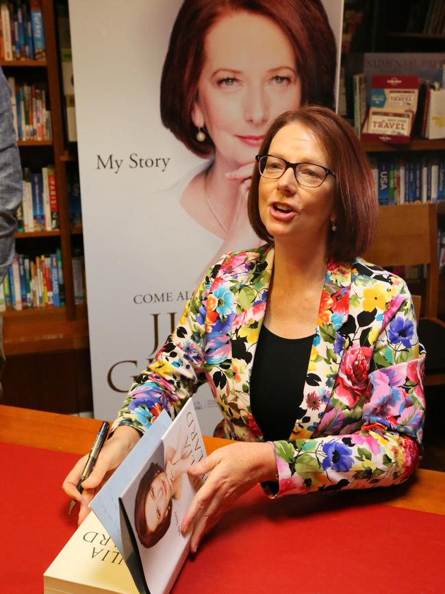 Julia Gillard signs copies of her book, My Story, at a Canberra bookstore. Picture: File