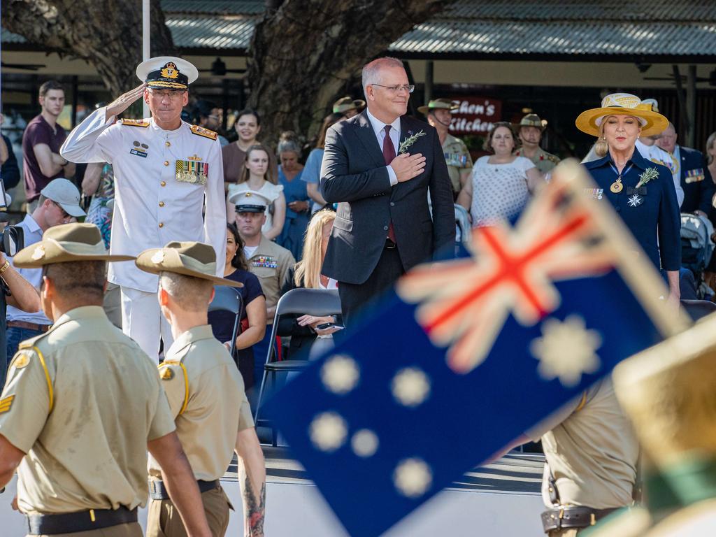 Prime Minister Scott Morrison watches the troops march by in Darwin. Picture: Jason Edwards