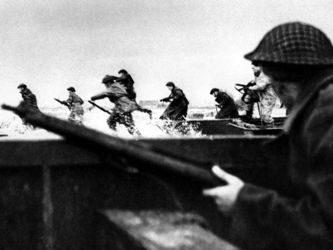 ‘I wish the Australians were with us’ … Canadian soldiers land on D-Day: June 6, 1944. The legendary ‘Rats of Tobruk’ weren’t storming the beaches, but Aussie airmen, sailors and even some soldiers were very much present.