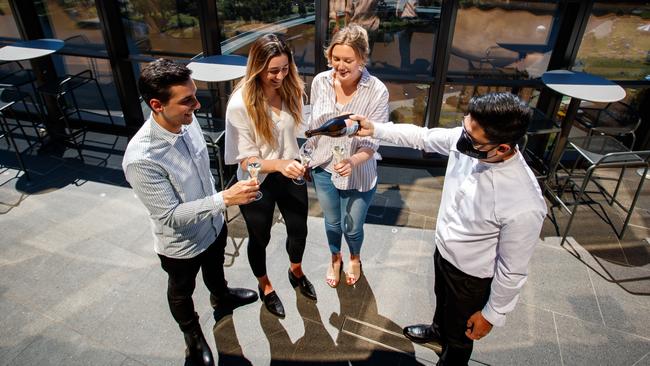 Nick Babadimas, Maddie Murphy, Jessica McHugh and Bar staff member Dennis Andrada at SkyCity Eos Sol Bar. Picture: Matt Turner.