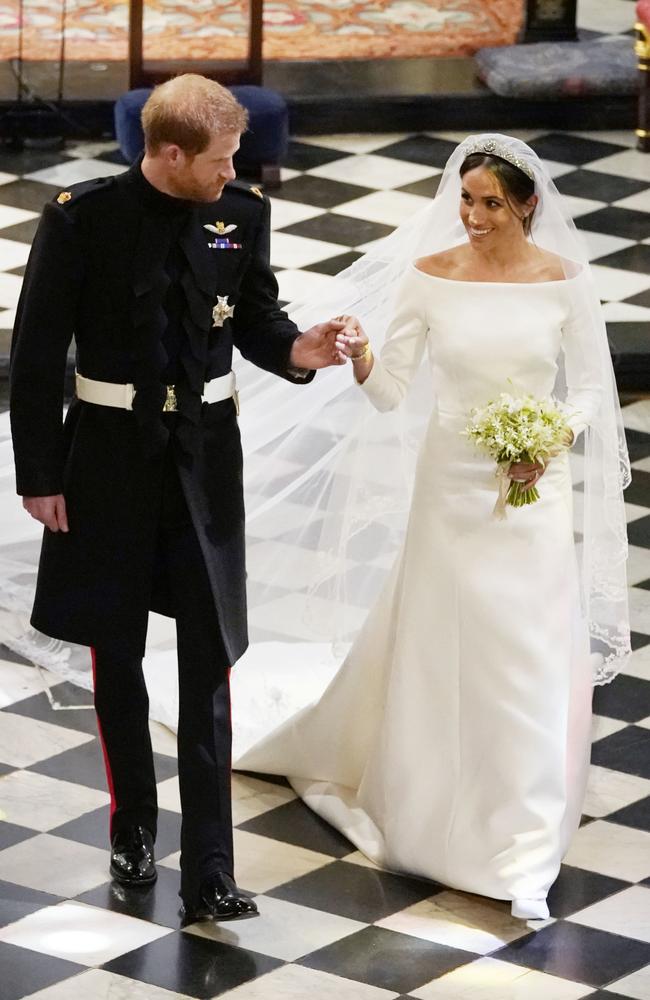 <b>2018:</b> Prince Harry and Meghan Markle marry at St George’s Chapel, Windsor, in a lavish and star-studded ceremony watched by millions. Picture: Getty