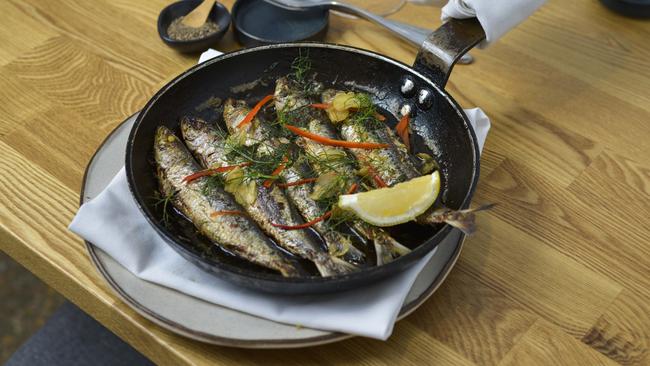 Sardine: Roasted fillet of fish with celeriac, black garlic and tempura oyster. Picture: Dannika Bonser