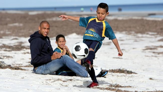 Ex-Adelaide United forward Cristiano with his sons Raphael and Matheus in 2009.