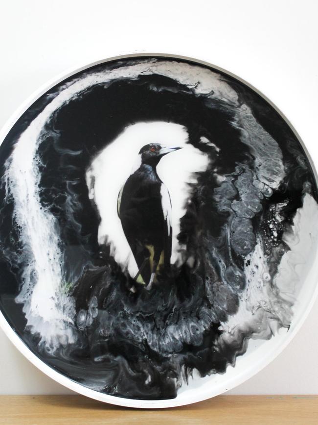 A side table featuring an image of a magpie created by Beams. Picture: Dayne Beams