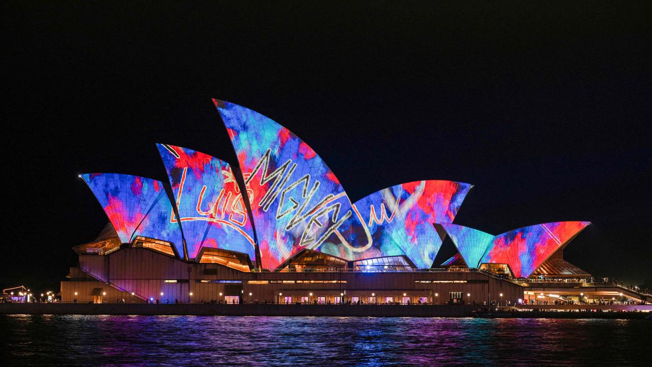 Visitors have hung around for the lights and great food at the 15th Vivid Sydney Festival. Picture: Ayush Kumar / AFP