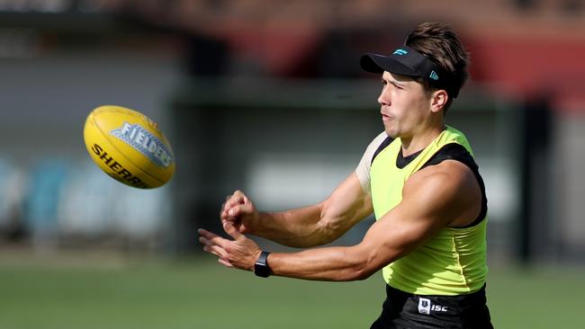 Tobin Cox has been named on a half-forward flank. Picture: AAP/Kelly Barnes