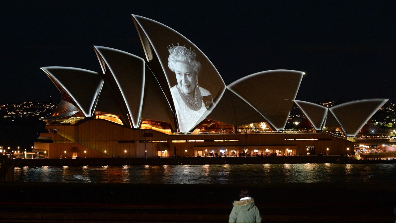 The Opera House sails were lit up with the picture of Queen Elizebeth II to commemorate her life, but there will be no tribute to King Charles III. Picture: Muhammad Farooq/AFP.