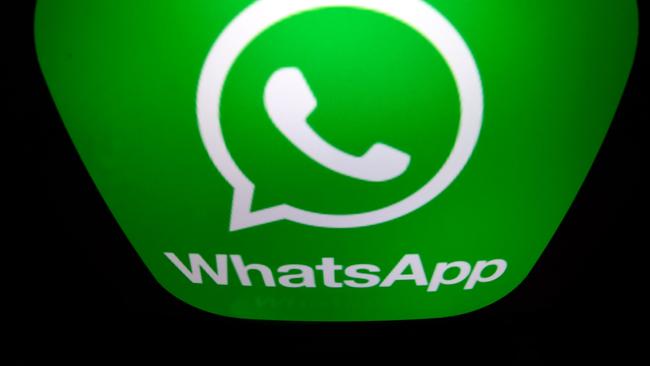 (FILES) In this file photo taken on December 28, 2016 a picture taken in Paris shows the logo of WhatsApp mobile messaging service. - WhatsApp on January 15, 2021 delayed a data-sharing change as users worried about privacy fled the Facebook-owned messaging service and flocked to rivals Telegram and Signal. "We're now moving back the date on which people will be asked to review and accept the terms," WhatsApp said in a blog post. (Photo by Lionel BONAVENTURE / AFP)