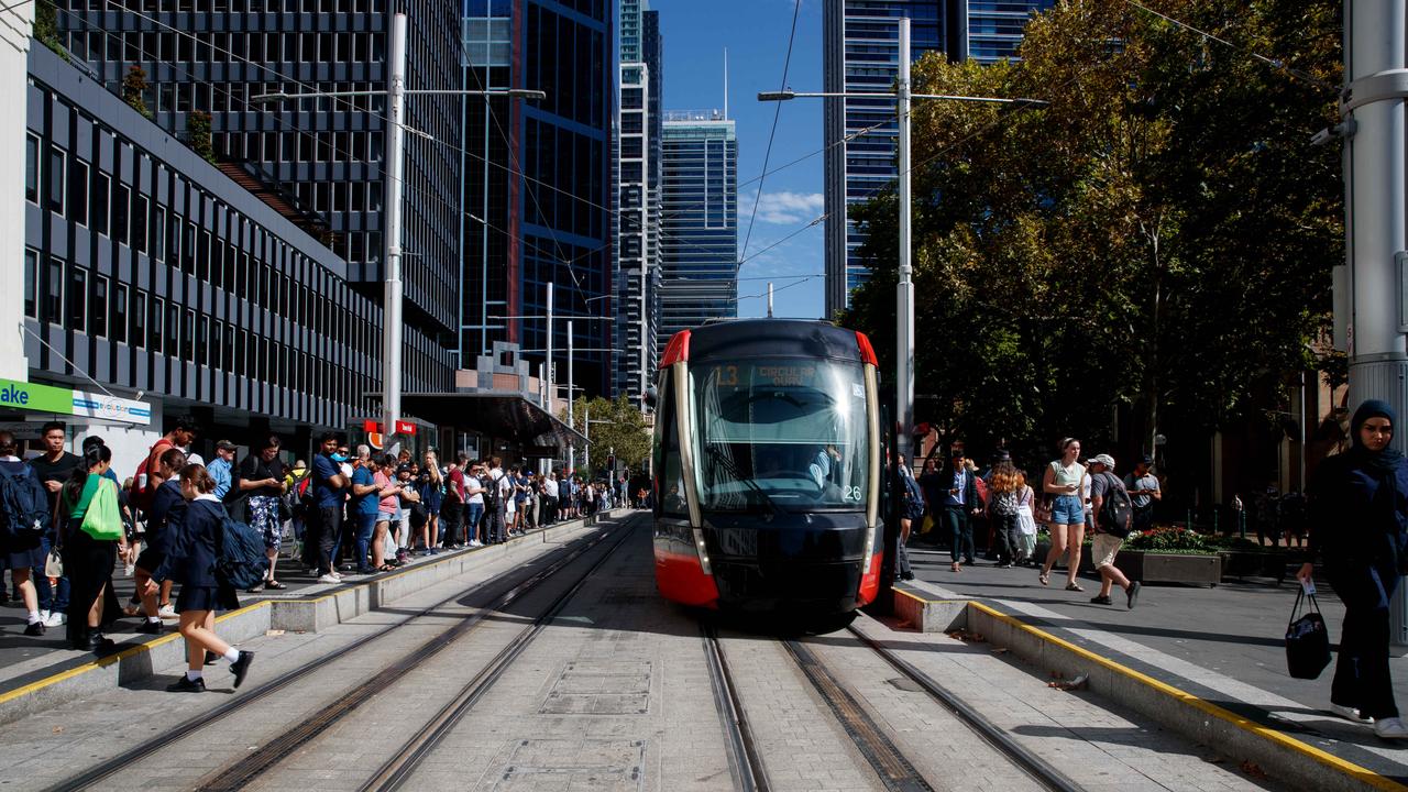 SYDNEY, AUSTRALIA – NewsWire Photos MARCH 8, 2022: People leave Town Hall Station and wait for light rail in Sydney after the rail network closed on Wednesday afternoon. Picture: NCA NewsWire / Nikki Short