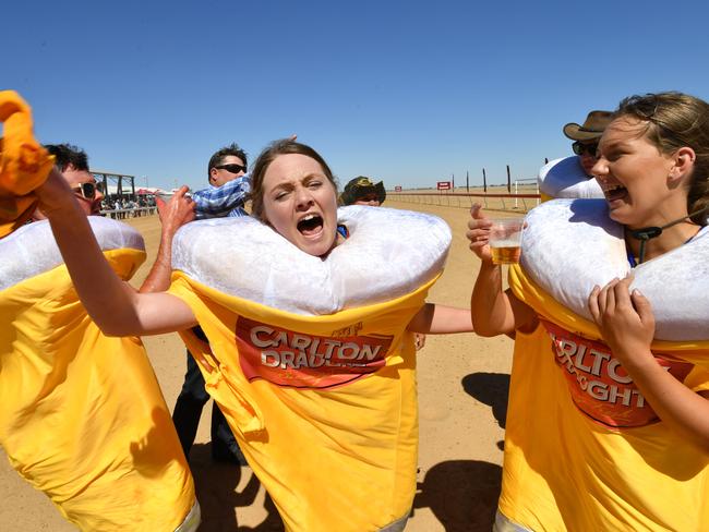 The winner of the Schooner Cup gets beer for a year. Picture: AAP Image/Darren England.