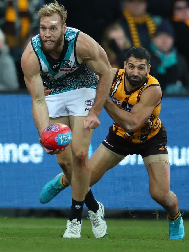 Jack Hombsch of the Power is tackled during round 11. Picture: Getty Images