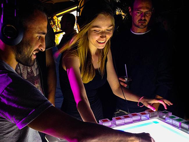 players playing the Mash Machine ......a new interactice music board which will feature at the Backstreet Block Party at North Sydney