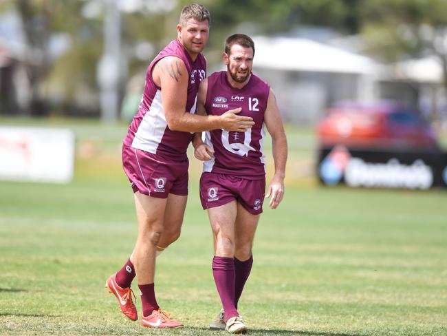 2003 AFL grand final rivals Jason Cloke (Collingwood Magpies) and Jason Akermanis (Brisbane Lions) playing for Queensland Over-40s at the AFL Masters National Carnival. Picture: Dave Gleeson