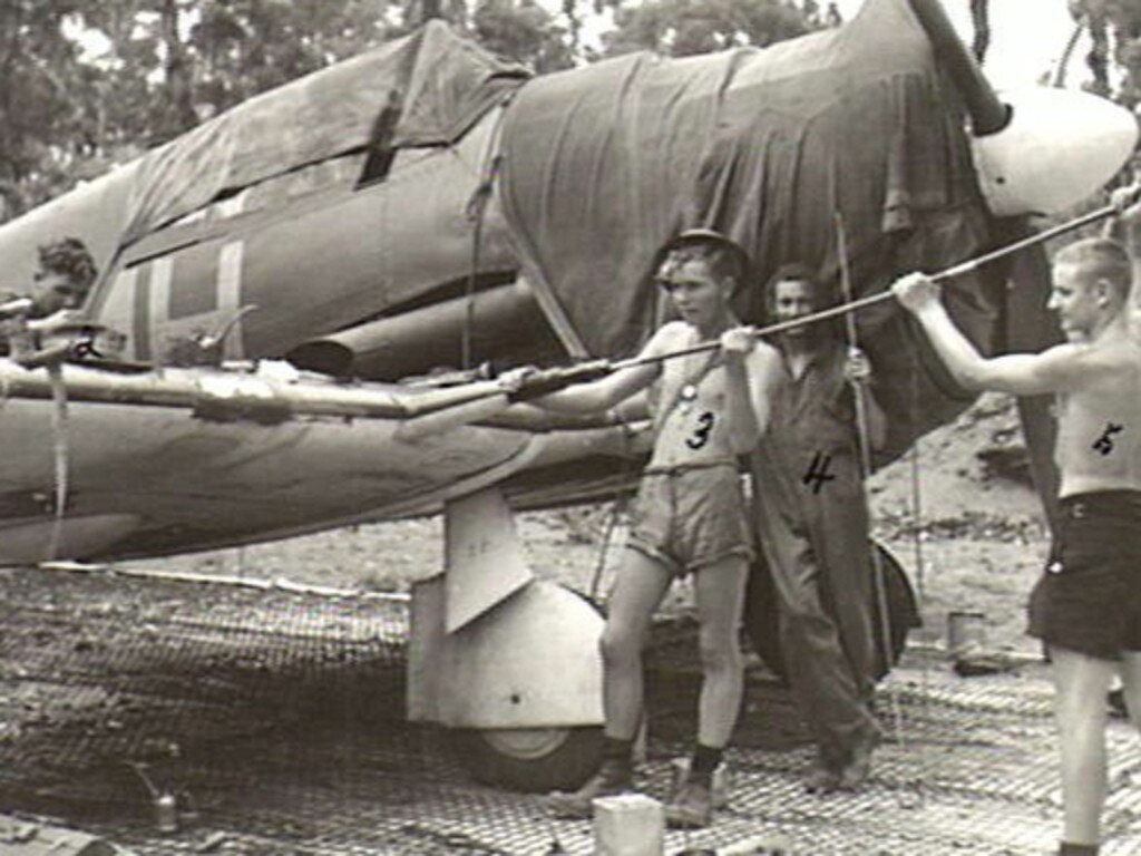 Cleaning guns of 83 Squadron RAAF Boomerang Nov 1943. Picture: Australian War Memorial