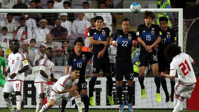Omar Abdulrahman curls a free kick in UAE’s World Cup qualifying loss to Japan. Picture: AFP