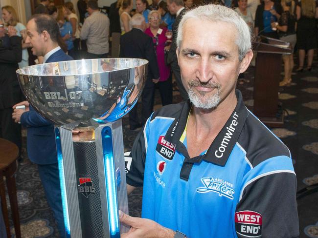 Adelaide Strikers coach Jason Gillespie with the winners trophy during a civic reception at Adelaide Town Hall, Thursday, February 22, 2018. Strikers received a civic reception for winning the BBL. (AAP Image/ Brenton Edwards)