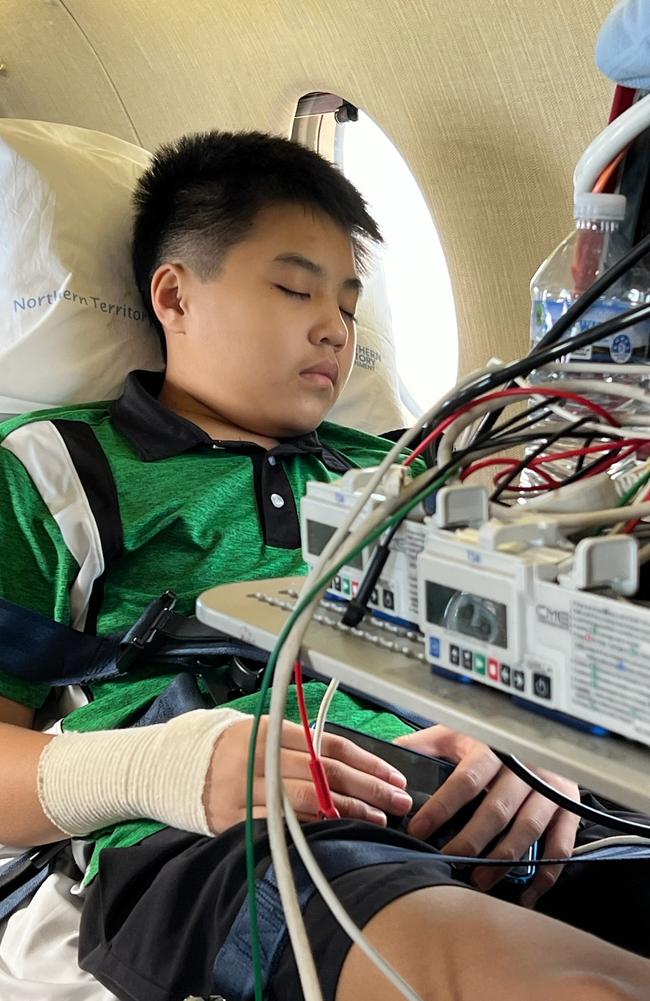 Essington School student Jayden Wong, 15, on a CareFlight aeromedical charter from Darwin to Sydney, to immediately begin treatment for grey zone lymphoma. Picture: Supplied