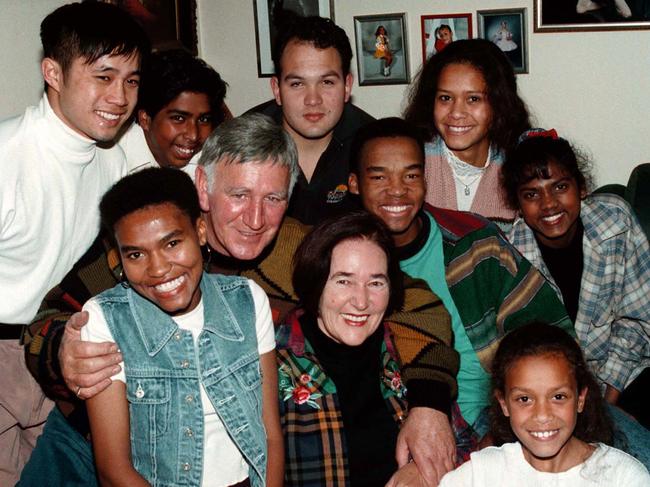 Shane Howard’s mum Pat, centre who was named Barnardos Mother of the Year in 1996 with her late husband Bert Howard and some their 16 adopted children who were adopted from all around the world.