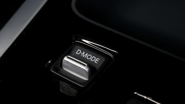 The console features a D-Mode button to choose between sport, off-road and towing modes.