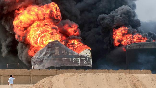 A raging fire at oil storage tanks a day after Israeli strikes on the port of Yemen's Houthi-held city of Hodeida. Picture: AFP