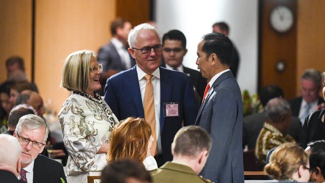 Former Australian Prime Minister Malcolm Turnbull, centre, and his wife Lucy greet Indonesian President Joko Widodo. Picture: AP