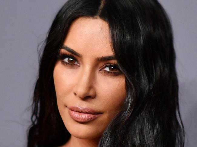 (FILES) In this file photo taken on February 6, 2019, US media personality Kim Kardashian West arrives to attend the amfAR Gala in New York. - Kim Kardashian found herself caught up in an unlikely international art smuggling row on May 4, 2021 involving an ancient Roman sculpture that was imported to California under her name. (Photo by ANGELA  WEISS / AFP)