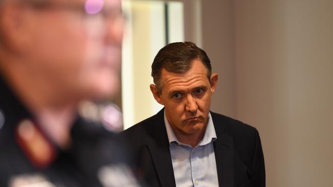 Chief Minister Michael Gunner listens to Police Commissioner Jamie Chalker. Picture: Amanda Parkinson