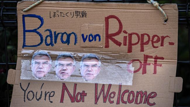 A banner is hung from a fence during a demonstration against the Games after IOC vice president John Coates told organisers the Games would open in just over two months, even if Tokyo and other parts of Japan were under a state of emergency because of rising Covid-19 cases. Picture: Getty Images