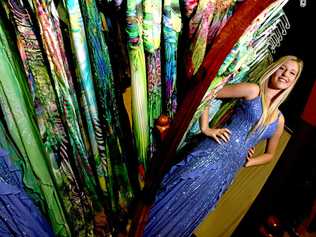 GET READY FOR GLAM: Dresses and suits, some worth hundreds of dollars, are up for grabs for drought-affected teens. Picture: John Gass /