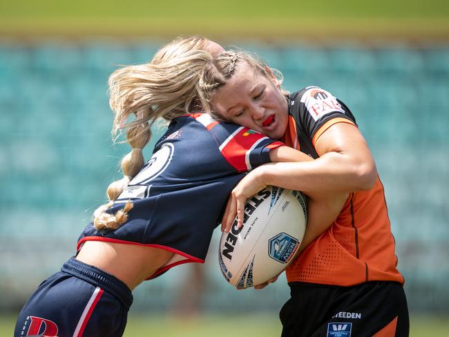 Katie Stevens tackles Katelyn Whitehead. Picture: Julian Andrews